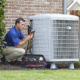 Heating and Cooling-hvac Service Tech Repairing an Air Conditioner
